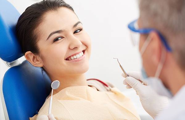 Patient smiling in dentist chair